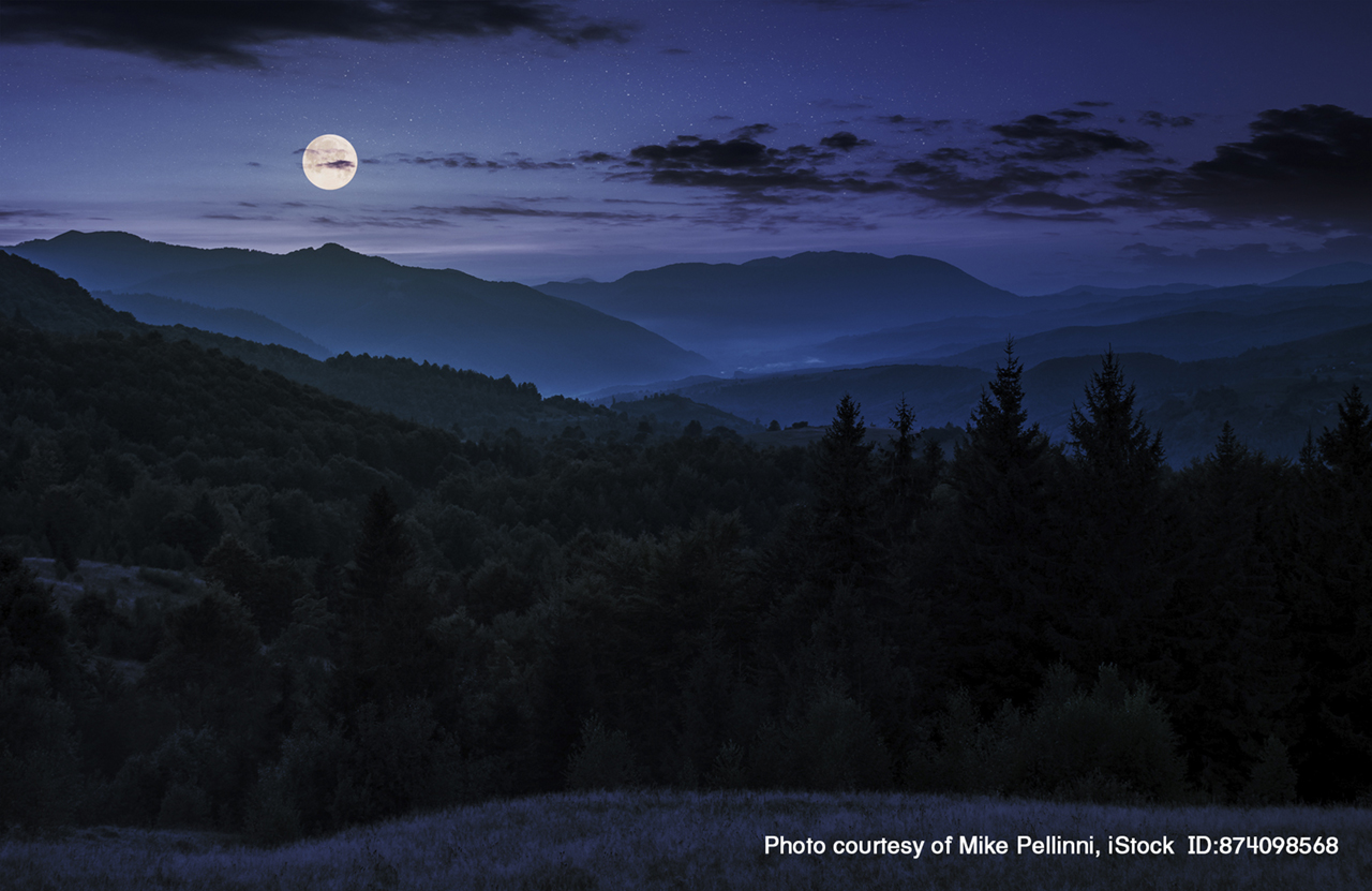 Moon over mountains